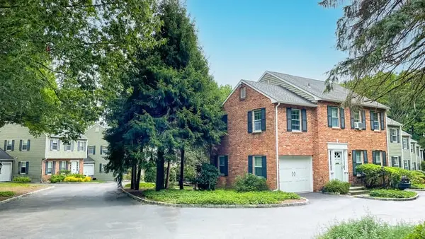 This home is part of Coachman's Square, New Canaan, CT Condo Complex