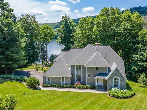 Waterfront contemporary single family home for sale located at 4 Harbour View Drive, New Fairfield, CT 06812