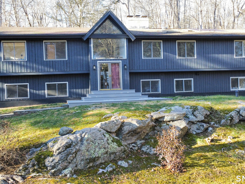 Waterfront contemporary single family home for sale located at 26 Hill Farm Road, Weston, CT 06883