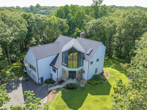 Waterfront contemporary single family home for sale located at 21 Woods End Drive, Wilton, CT 06897