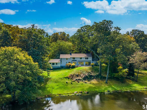 Waterfront single family home for sale located at 29 Hunting Ridge Road, Greenwich, CT 06831