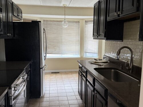 townhouse condo for sale located at 1611 Washington Boulevard, apt 1, Stamford, CT 06902
