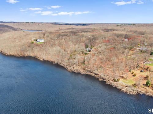 Waterfront contemporary single family home for sale located at 160 Lantern Ridge Road, New Canaan, CT 06840