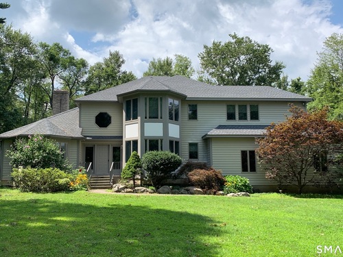 Contemporary single family home for sale located at 15 Black Pine Ridge, Ridgefield, CT 06877