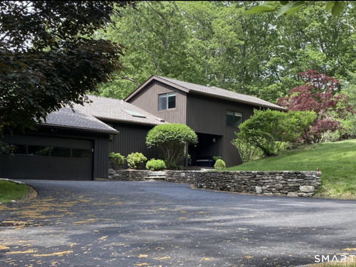 Contemporary single family home for sale located at 28 Pony Trail Road, Stamford, CT 06903