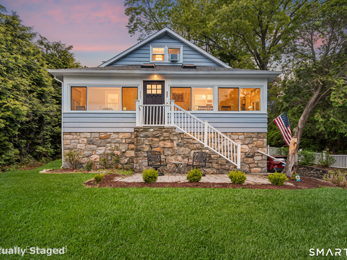Waterfront single family home for sale located at 557 Candlewood Lake Road, Brookfield, CT 06804