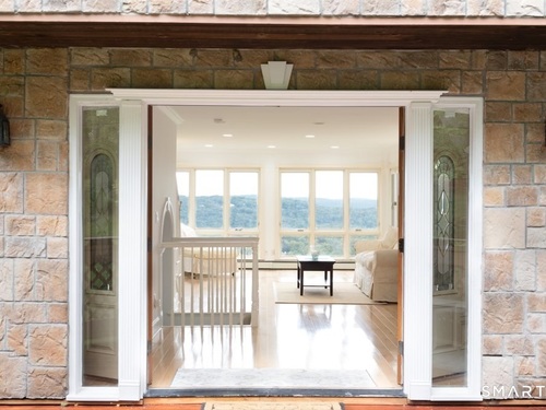 Contemporary single family home for sale located at 10 Hillcrest Court, Ridgefield, CT 06877
