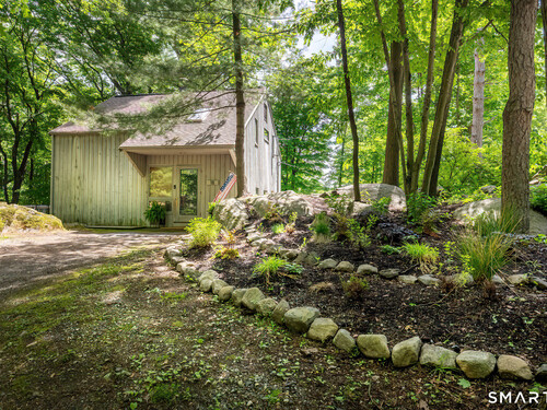 Waterfront contemporary single family home for sale located at 18 Indian Hill Road, Wilton, CT 06897