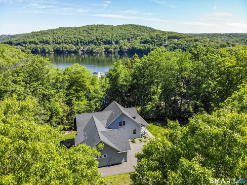 Waterfront single family home for sale located at 5 Bridge Road, Monroe, CT 06468