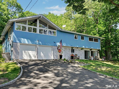 Contemporary single family home for sale located at 52 Seth Low Mountain Road, Ridgefield, CT 06877