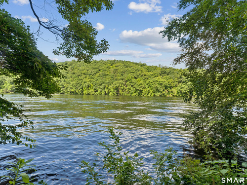 Waterfront single family home for sale located at 77 Algonquin Trail, Newtown, CT 06482