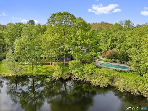 Waterfront contemporary single family home for sale located at 6 Old Orchard Drive, Weston, CT 06883
