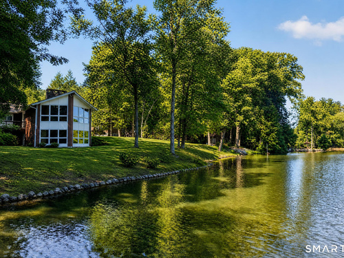 Waterfront single family home for sale located at 154 Driftwood Lane, Trumbull, CT 06611