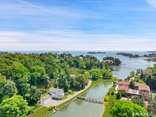 Waterfront single family home for sale located at 31 Meadow Wood Drive, Greenwich, CT 06830