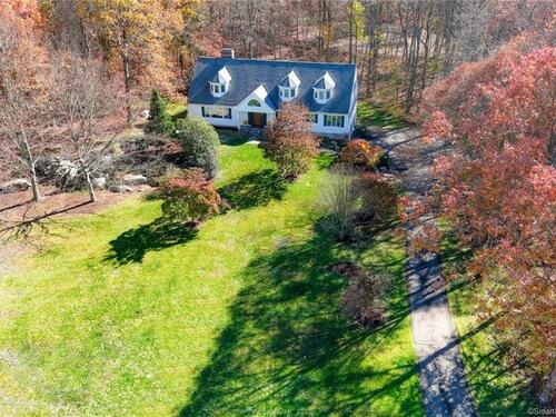 single family home for sale located at 321 Thayer Pond Road, Wilton, CT 06897
